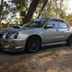 It looked exactly like this one, but with some tasteful OZ Prodrive wheels the previous owner bought.